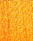 Krystal Flash in bright shimmering amber with sparkling reflective fibers by Hareline Dubbin, Inc for fly tying